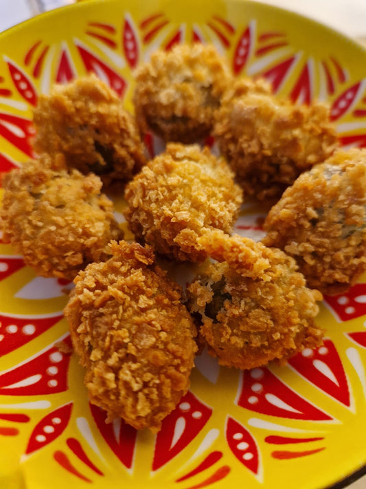 Panko fried olives in a Moroccan style tapas dish 