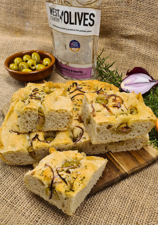 Cooked focaccia bread using rosemary and garlic olives