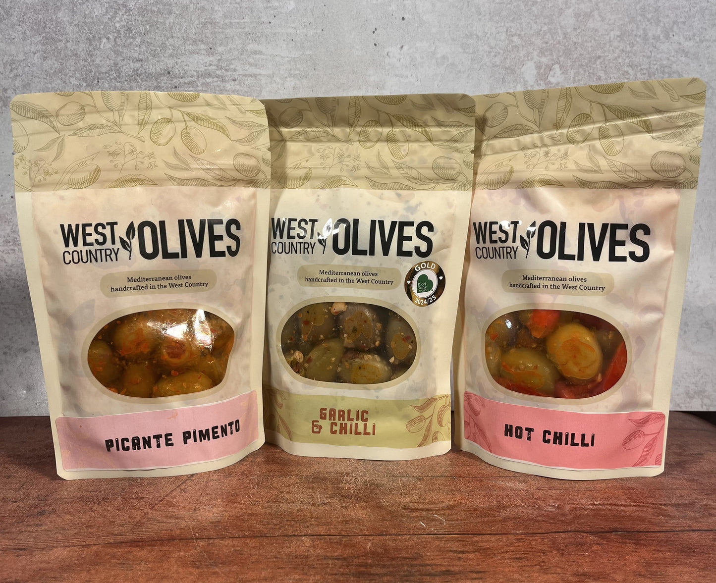 Trio of spicy flavoured olives, picante pimento, garlic and chilli and Hot Chilli