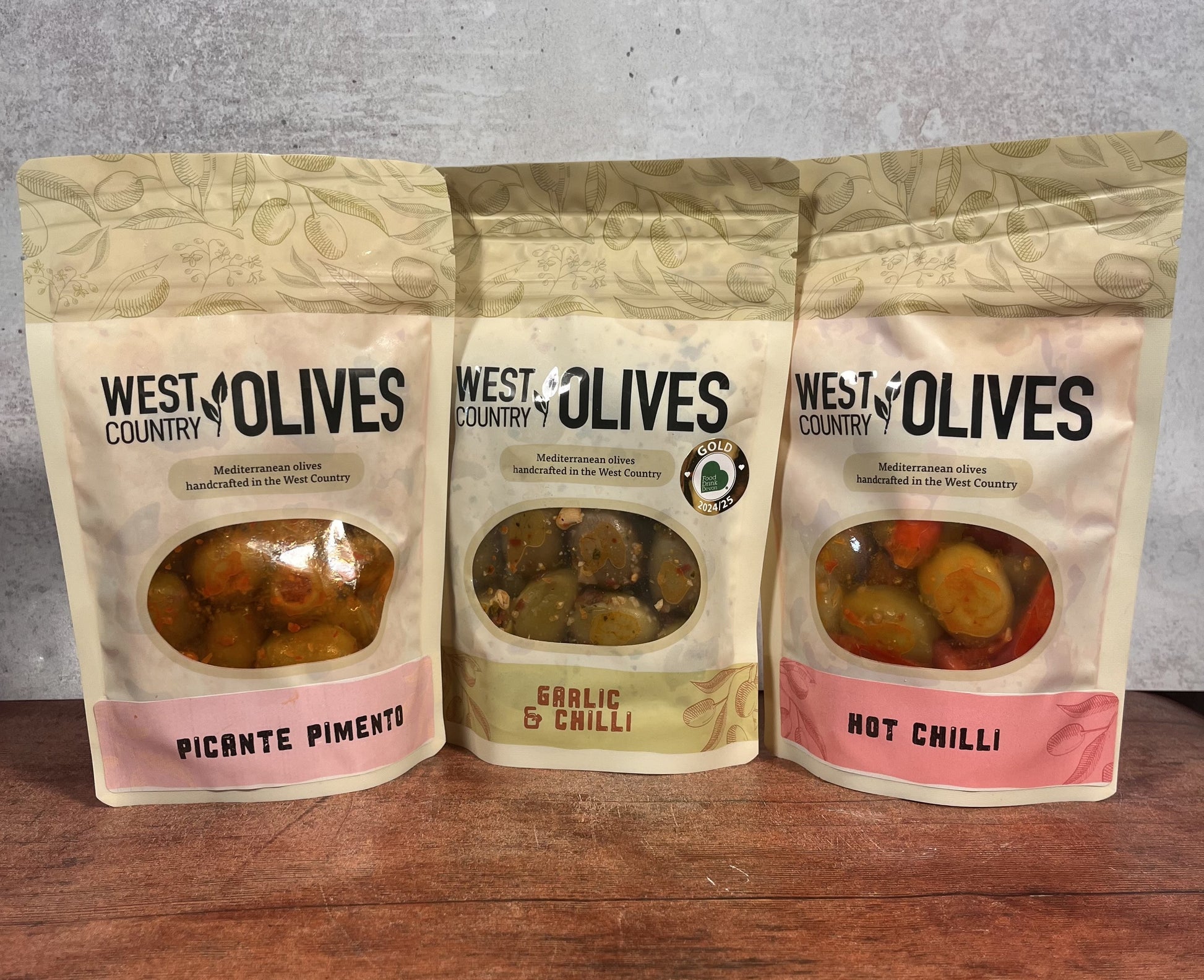 Trio of spicy flavoured olives, picante pimento, garlic and chilli and Hot Chilli